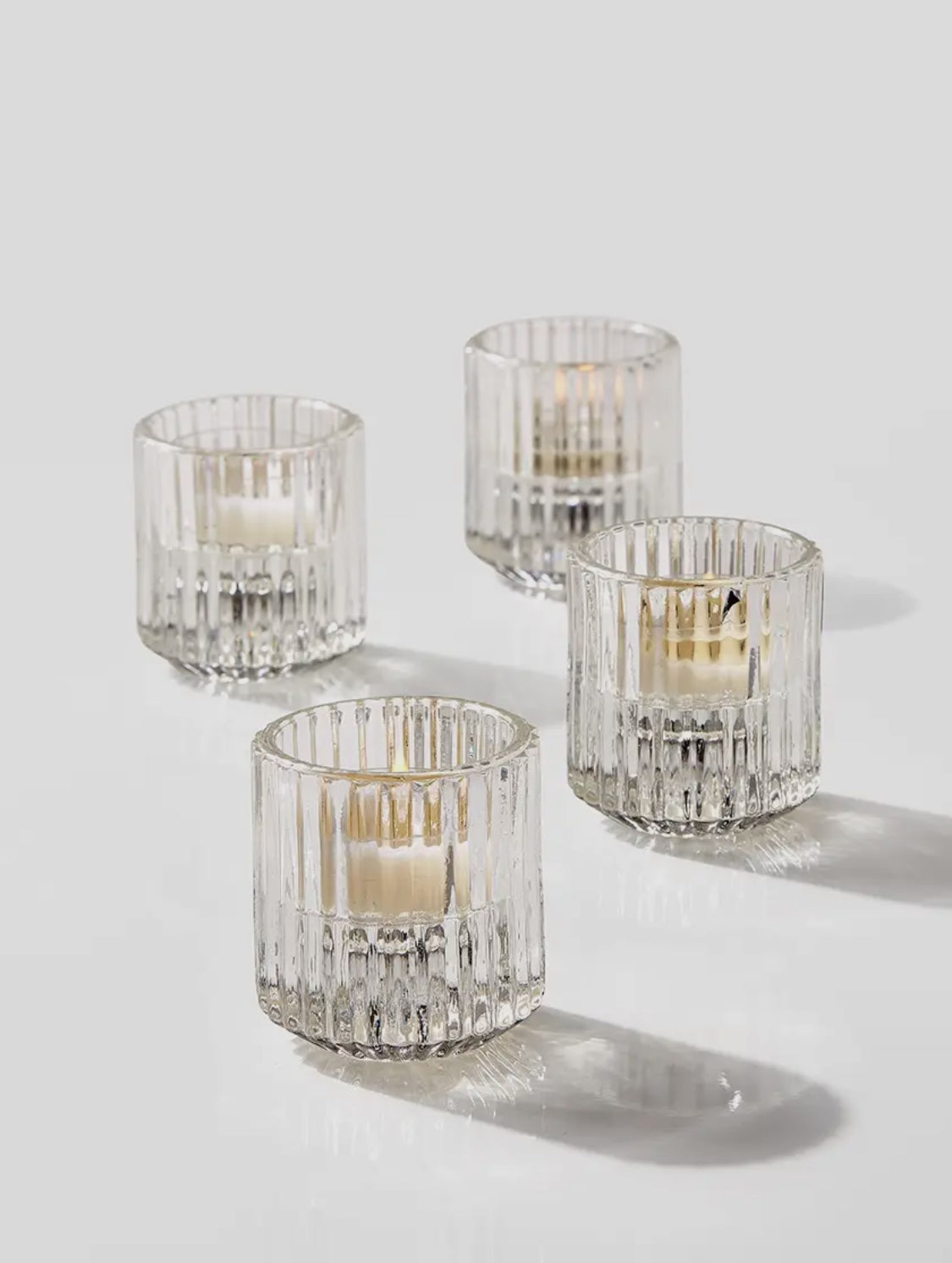 PLEATED GLASS CANDLE HOLDERS